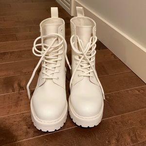 Brand new with tags. White lace up commando boots from H&M. Size 9 women’s.